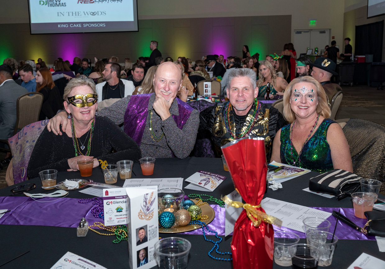 People enjoying themselves at the Cartersville Mardi Gras fundraiser benefitting Red Door Food Pantry